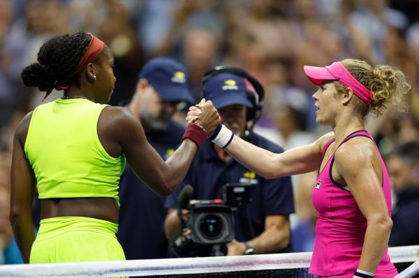 Laura Siegemund (R) of Germany shakes hands with Coco Gauff of the United States following their Women's Singles First Round match on Day One of the 2023 US Open on August 28, 2023.