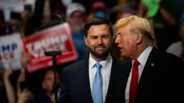 Do<em></em>nald Trump with J.D. Vance at Saturday’s (Sunday AEST) campaign rally at Grand Rapids, Michigan.